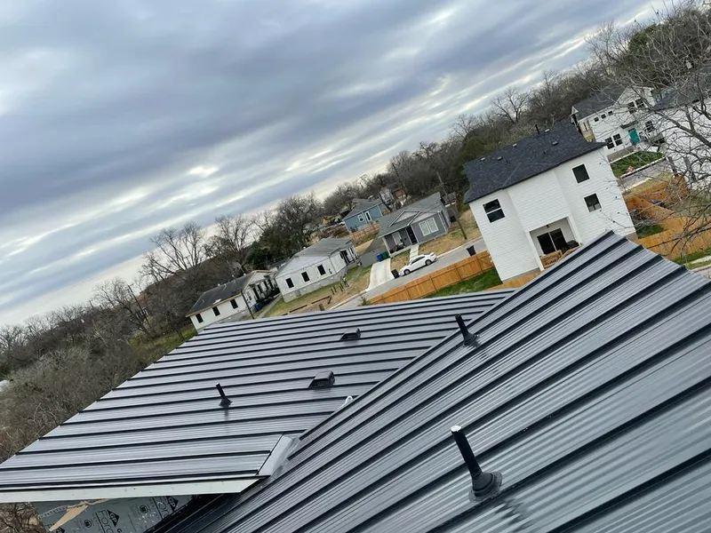 Standing seam metal roof panels with vents for Skylight Repair in Raymondville